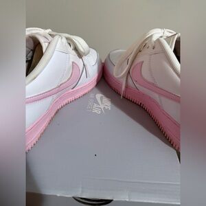 Used Nike Air Force one . 6.5 in big boys.  Also fits women size 9.